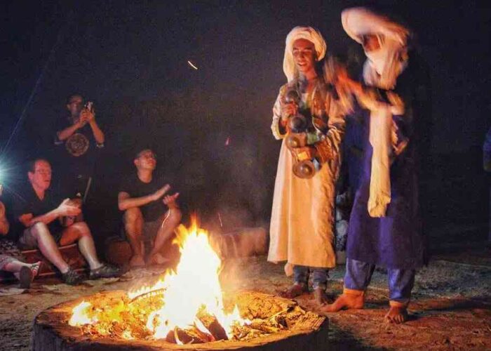 Enthralling evening entertainment with traditional music by a campfire on the 4 Day Sahara Desert tour from Marrakech to Merzouga.