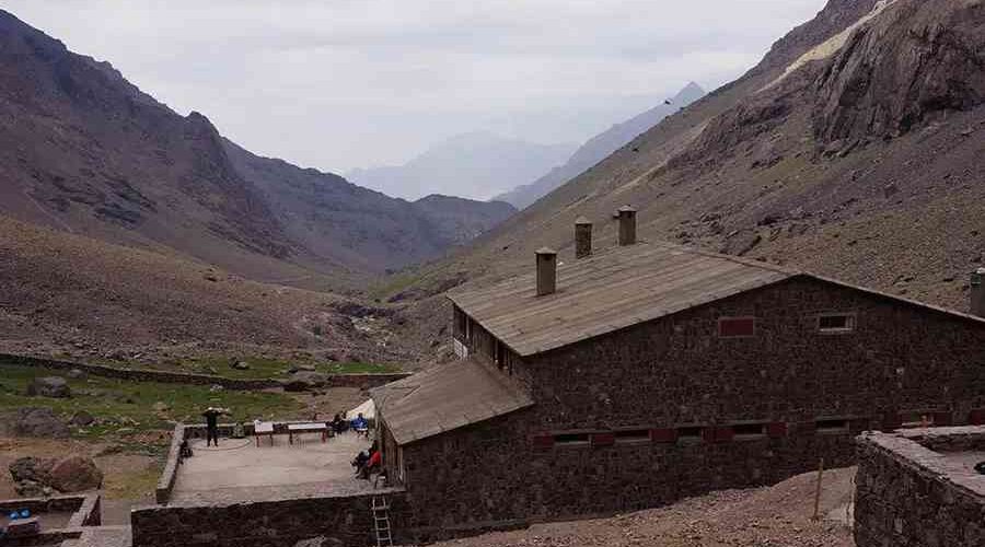 Mountain refuge nestled in the valley of the Atlas Mountains on the route to Mount Toubkal.