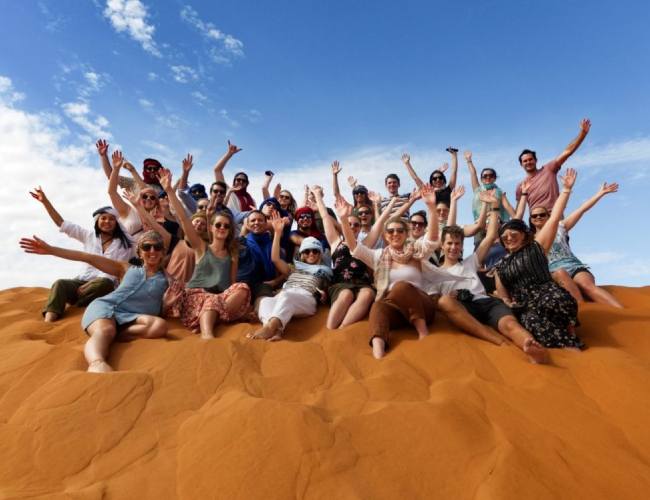 a group enjoying their group desert tour from Marrakech