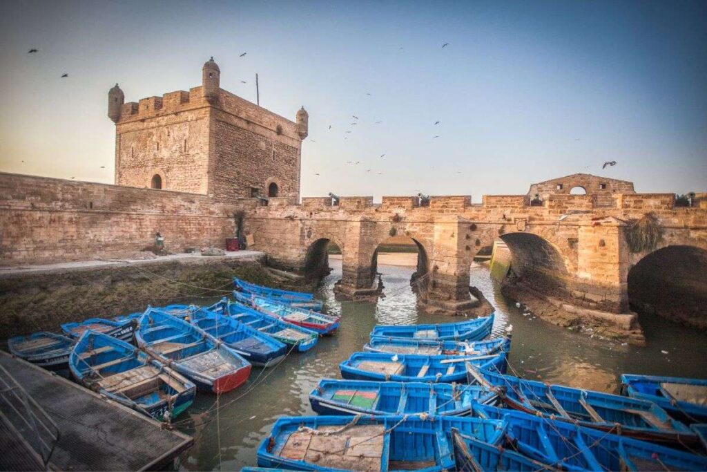Essaouira port with fishermen blue boats