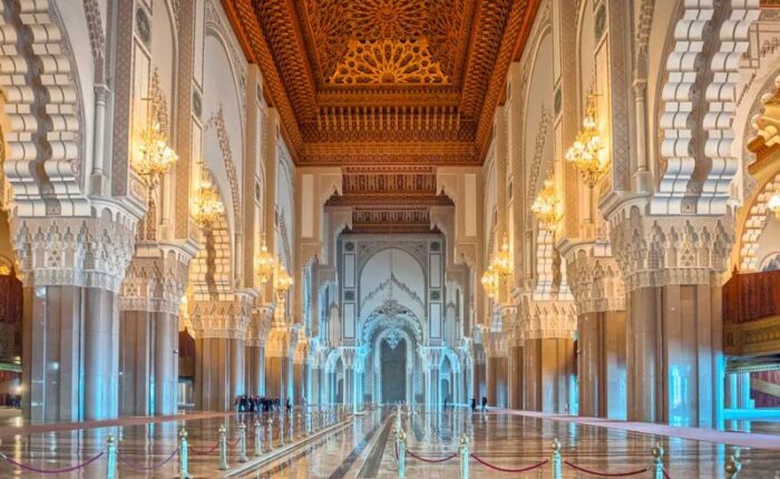 Interior view of the Hassan II Mosque in Casablanca showcasing the intricate architecture and ornate decoration.