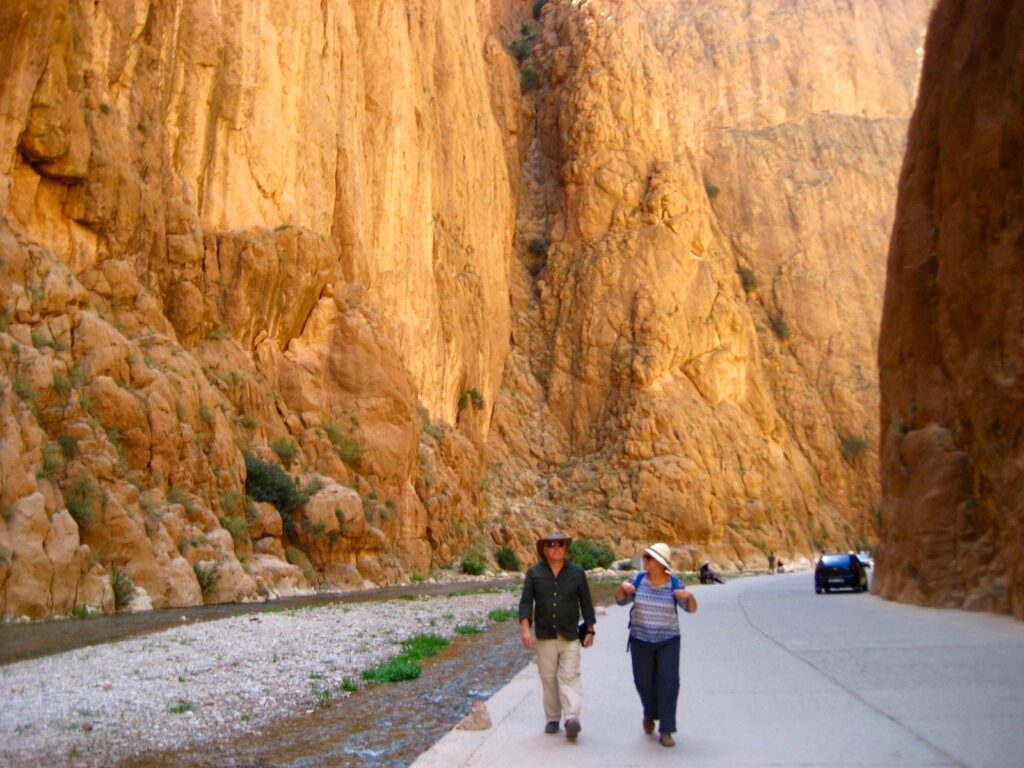 A couple walking in Todra gorges near Tinghir Oasis