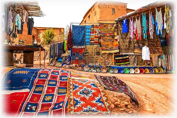 Berber rugs in a Kasbah Ait Ben Haddou rug shop