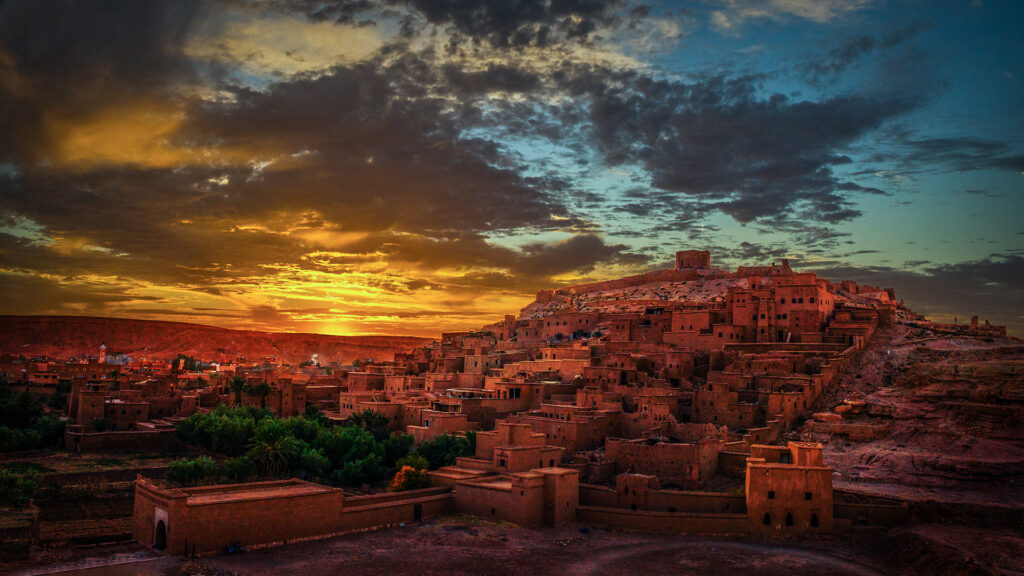 Sunset over Kasbah Ait Ben Haddou with dramatic sky