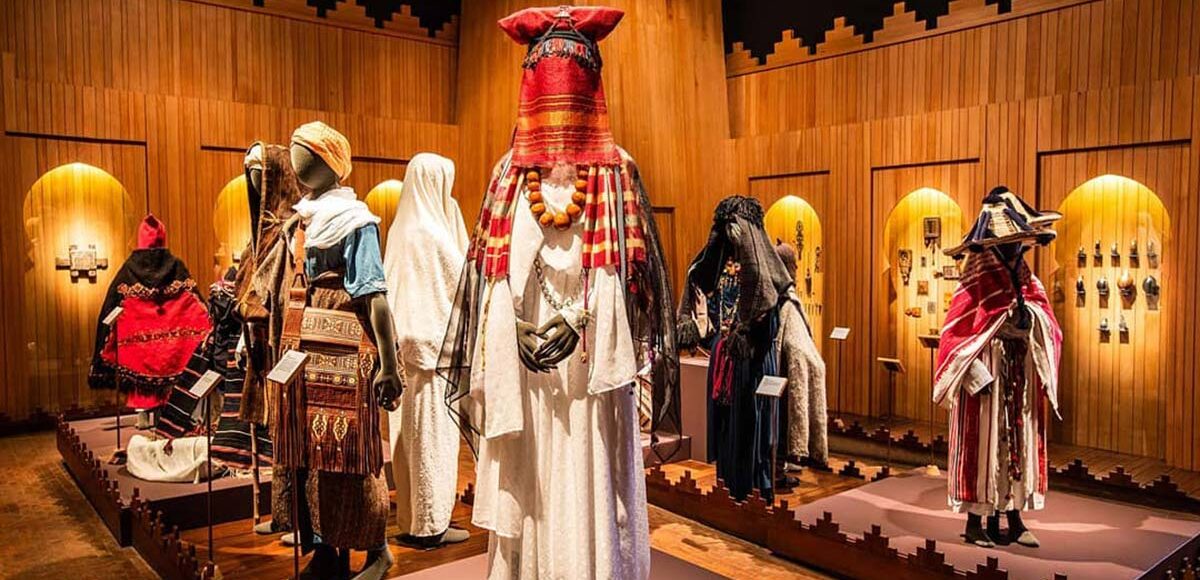 Assortment of traditional Berber costumes on display at the Yves Saint Laurent Berber Heritage Museum.